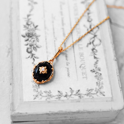 NOIR BOTANICA NECKLACE